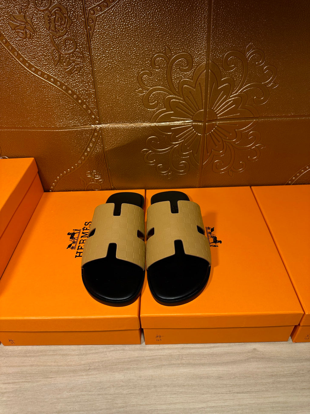 Hermes beige and black slide sandals with square strap details