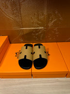 Hermes beige and black slide sandals with square strap details