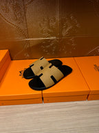 Hermes beige and black slide sandals, open toe with cross-strap design