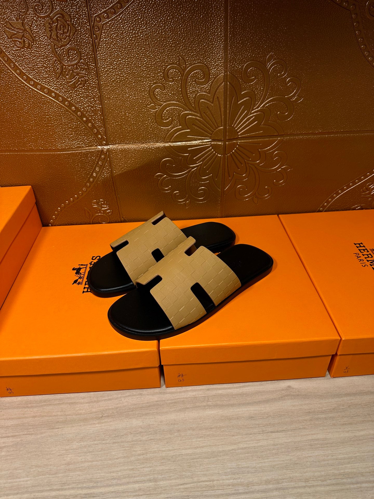 Hermes beige and black slide sandals, open toe with cross-strap design