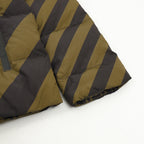 Fendi padded jacket close-up of quilted diagonal panels and curved seam