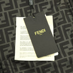 Fendi puffer jacket brand hang tag attached to patterned fabric
