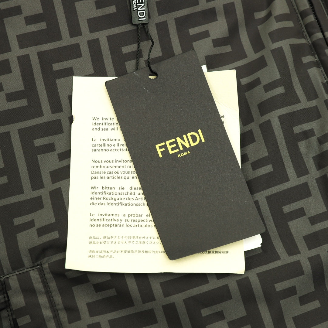 Fendi puffer jacket brand hang tag attached to patterned fabric