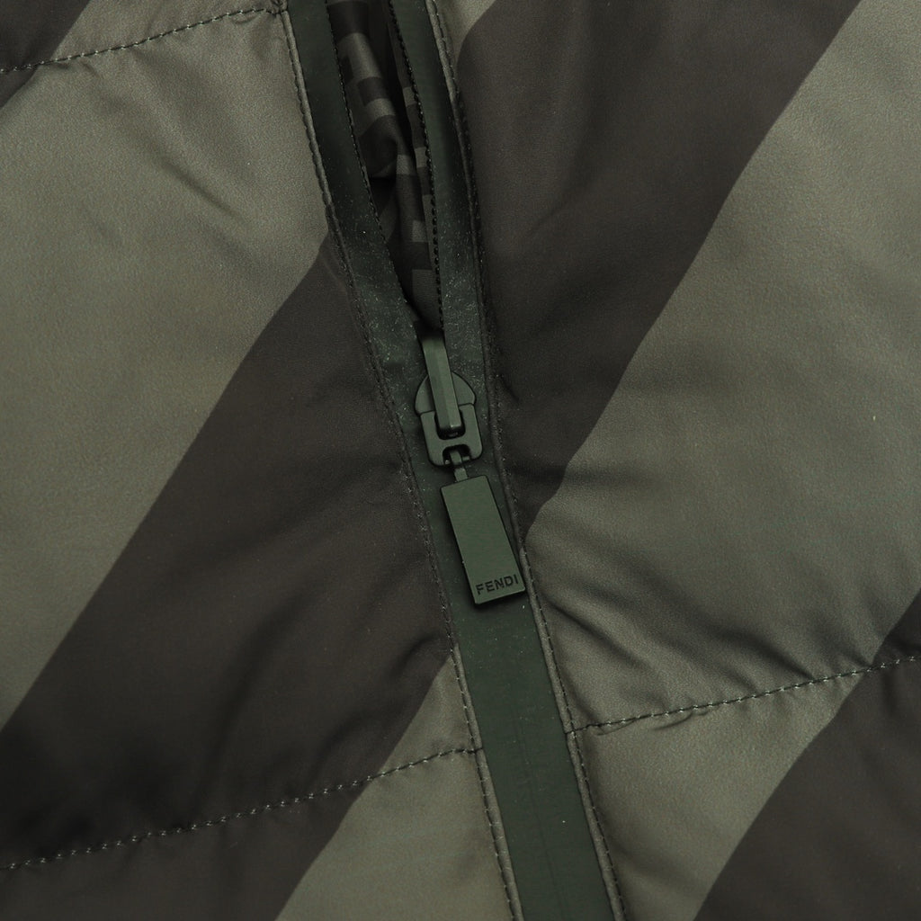 Fendi puffer jacket center front zipper with branded pull tab on striped quilted fabric