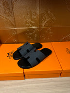Hermes slide sandals, dark blue textured strap with molded H detail