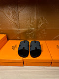 Hermes slide sandals in dark blue with molded H strap, open toe