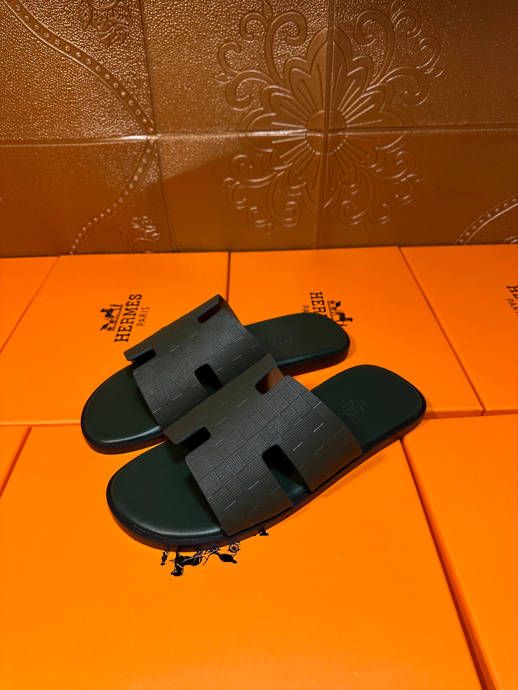 Hermes slide sandals, dark green wide strap with cutout H motif, slip-on style