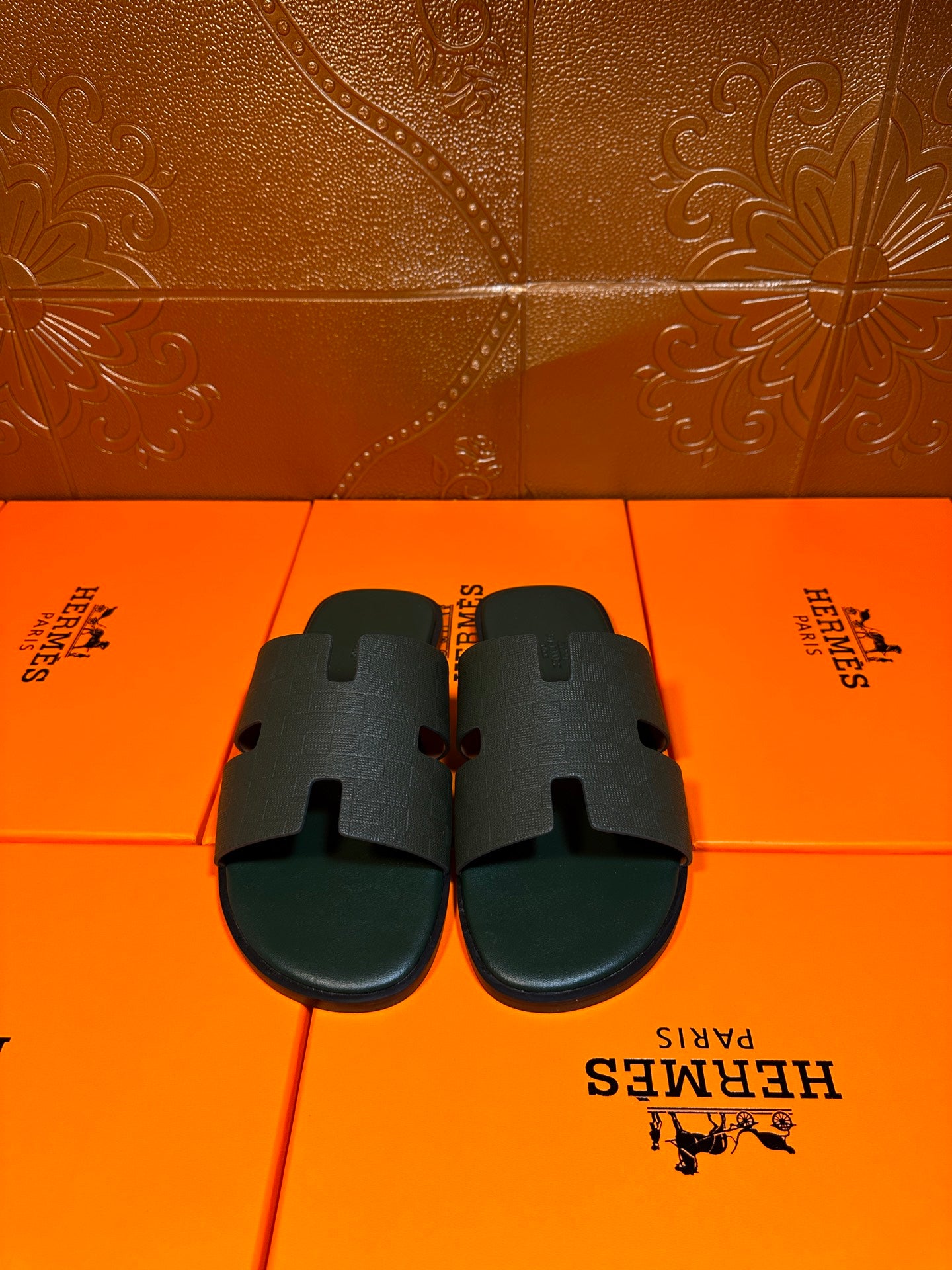 Hermes slide sandals, dark green with wide H-style strap and open toe design