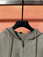 Olive green hooded jacket neckline with full front zipper
