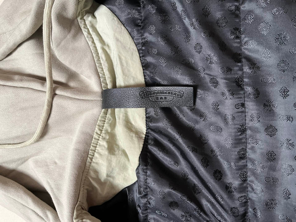 Two-tone jacket with dark patterned lining panel and contrast band
