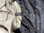 Two-tone jacket with dark patterned lining panel and contrast band