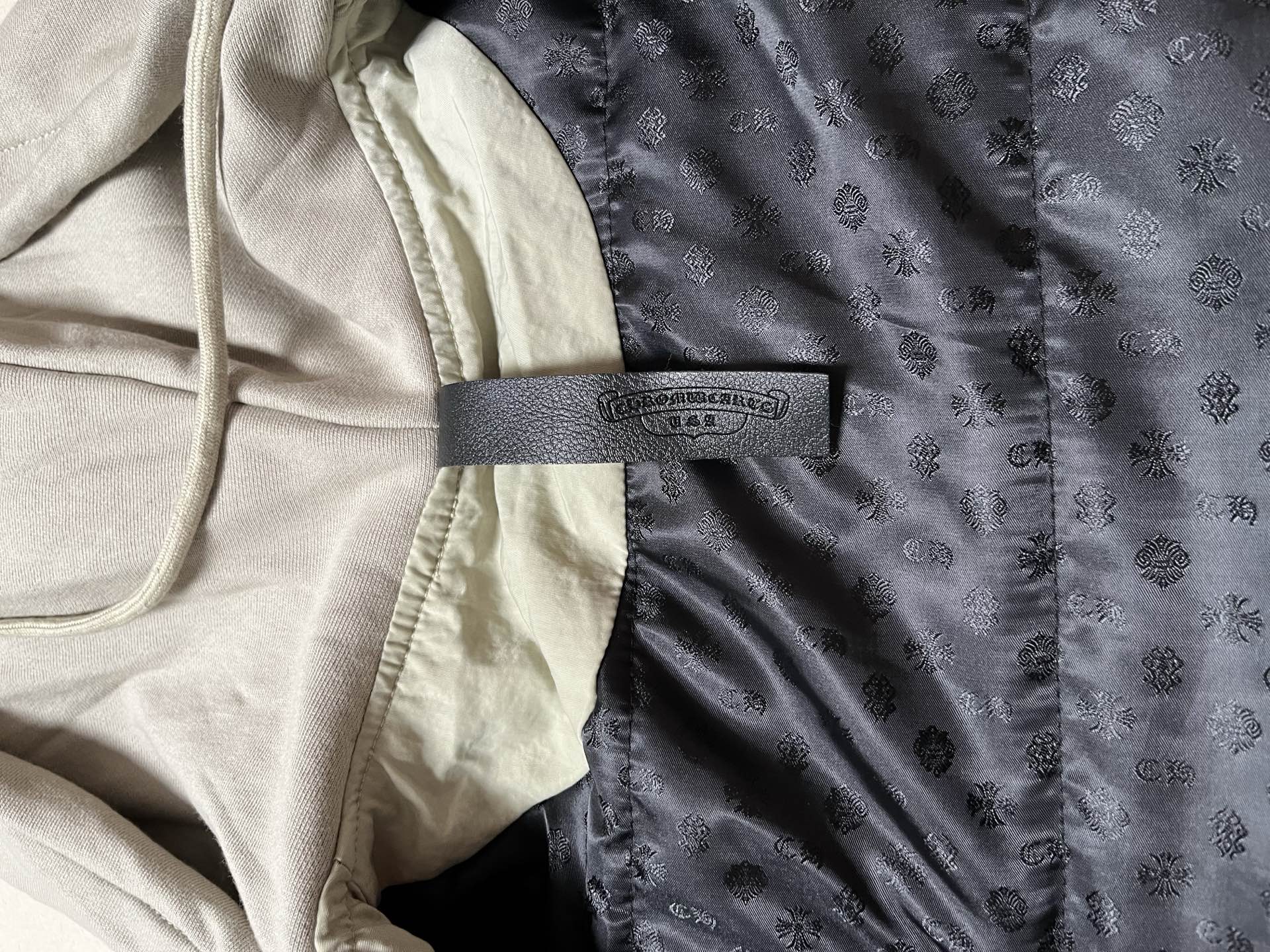 Two-tone jacket with dark patterned lining panel and contrast band