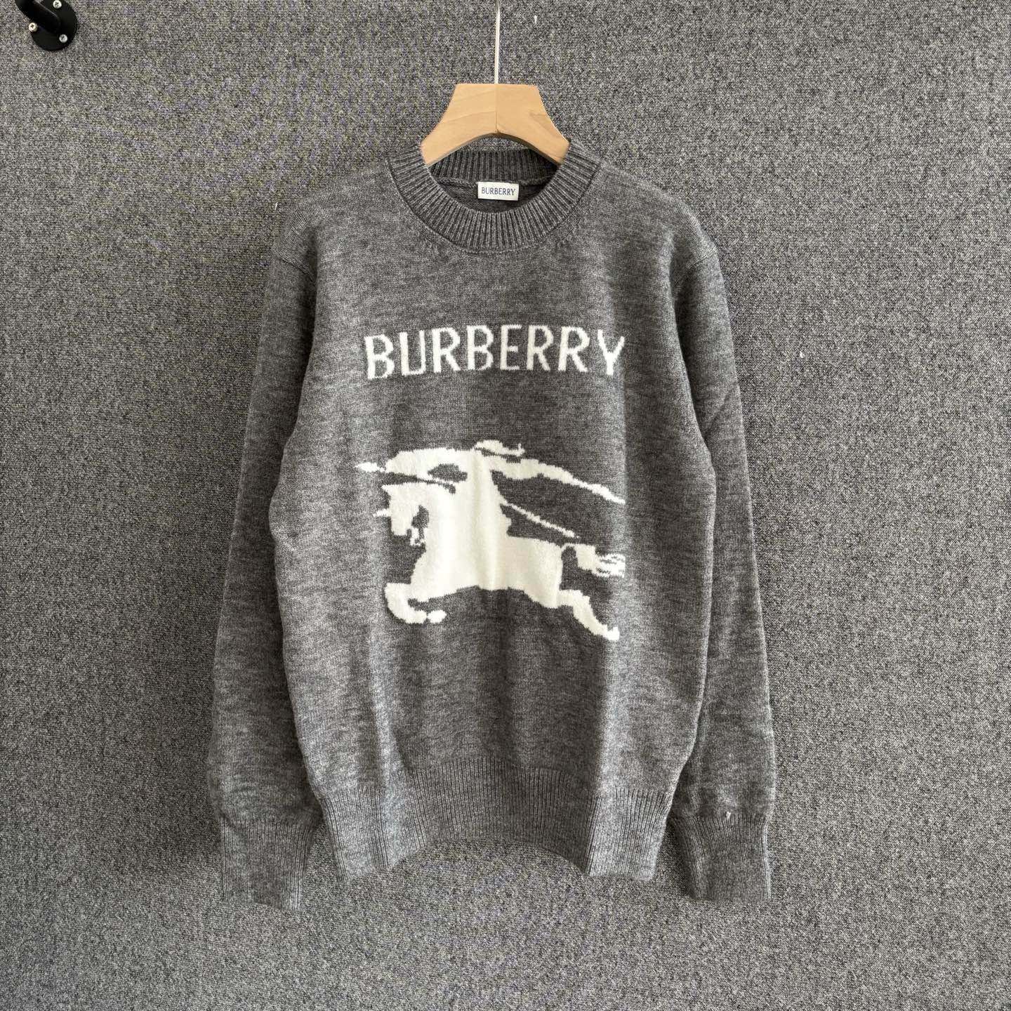 Gray crewneck knit sweater with BURBERRY text and white horse graphic on front