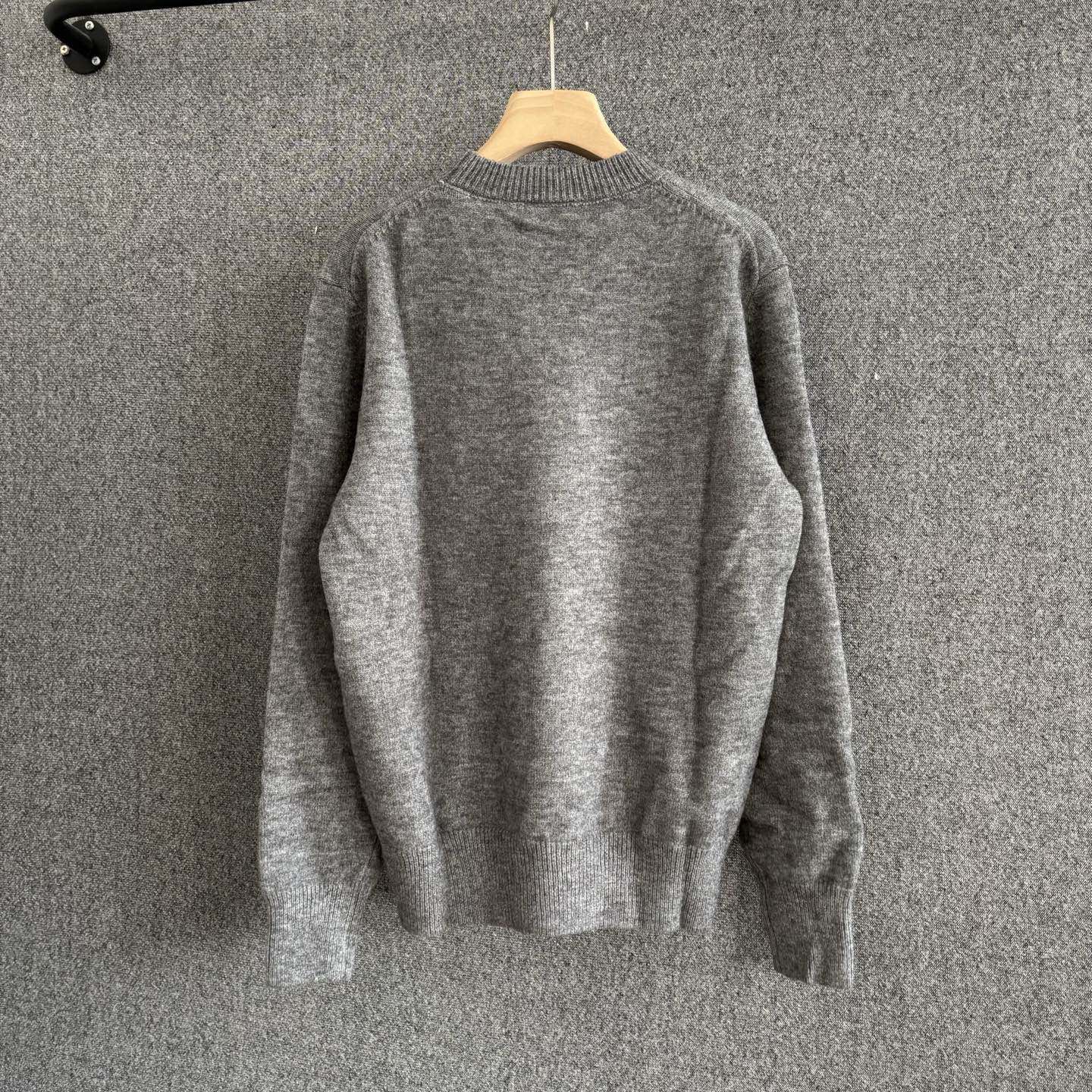 Gray crewneck knit sweater, plain back with ribbed hem and cuffs