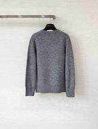 Grey long-sleeve sweater with ribbed crew neck and plain back