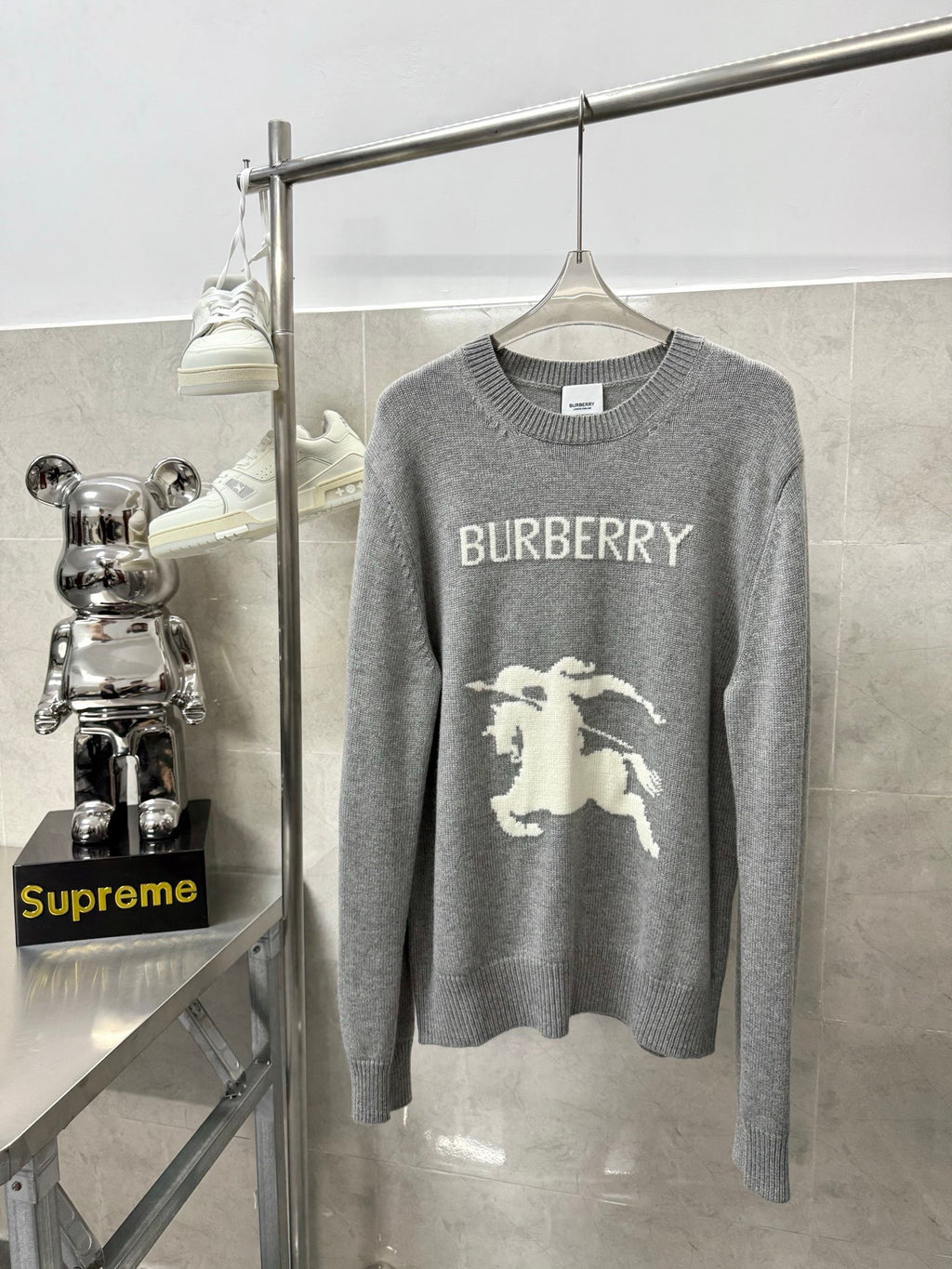 Gray crewneck knit sweater with BURBERRY wordmark and white horse graphic