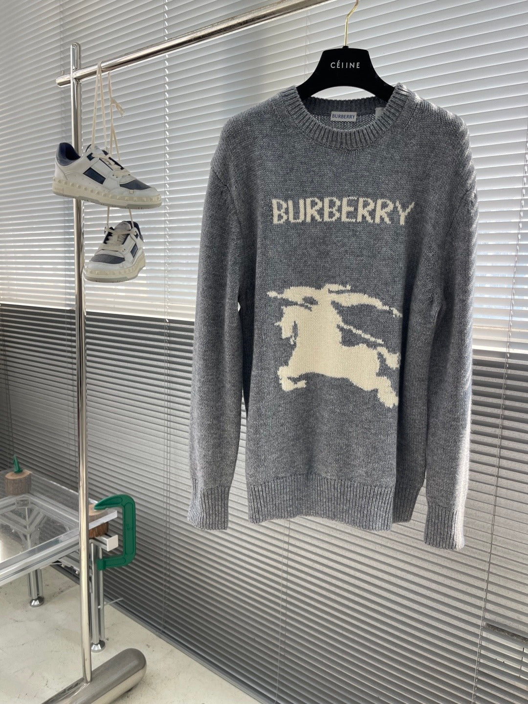 Grey knit sweater with BURBERRY text and large horse graphic