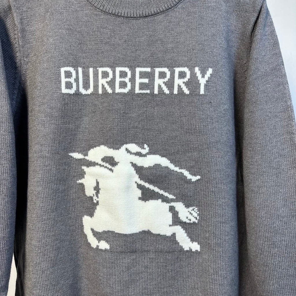 Gray Burberry sweater with 'BURBERRY' text and white horse graphic