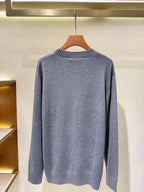 Gray crewneck knit sweater with long sleeves, plain back view.