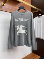 Gray crewneck knit sweater with BURBERRY wordmark and white horse graphic on front