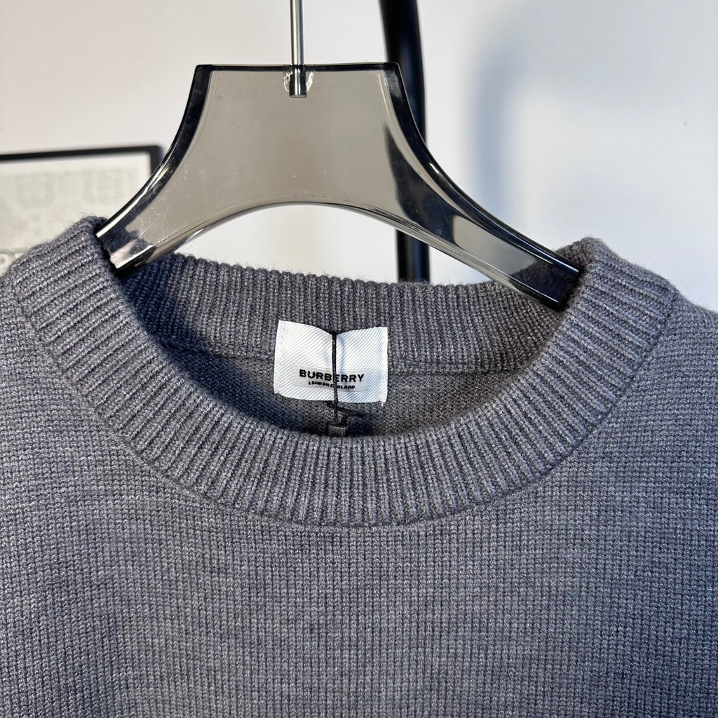 Gray Burberry knit collar with ribbed crew neckline and brand tag