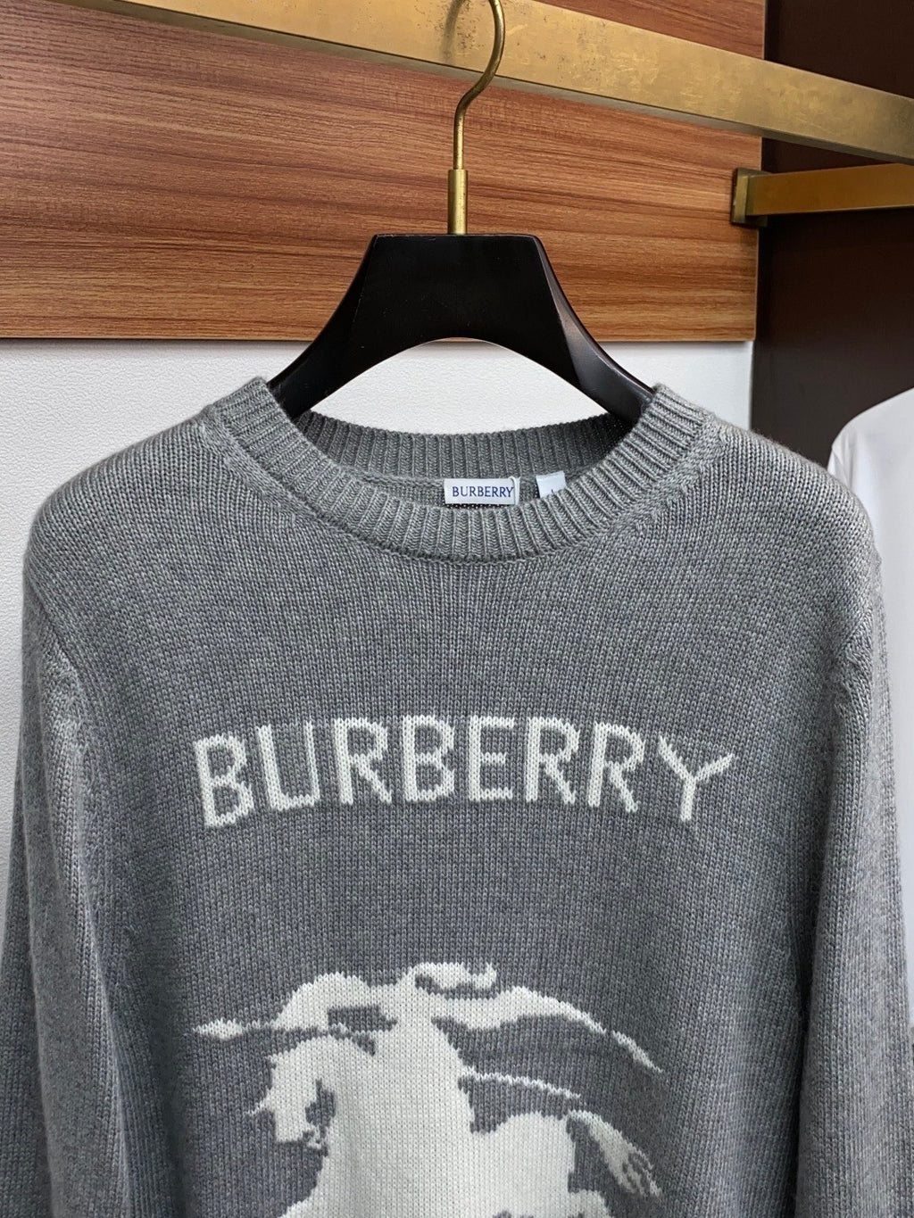 Gray crewneck knit sweater with ribbed collar, BURBERRY text, and horse graphic