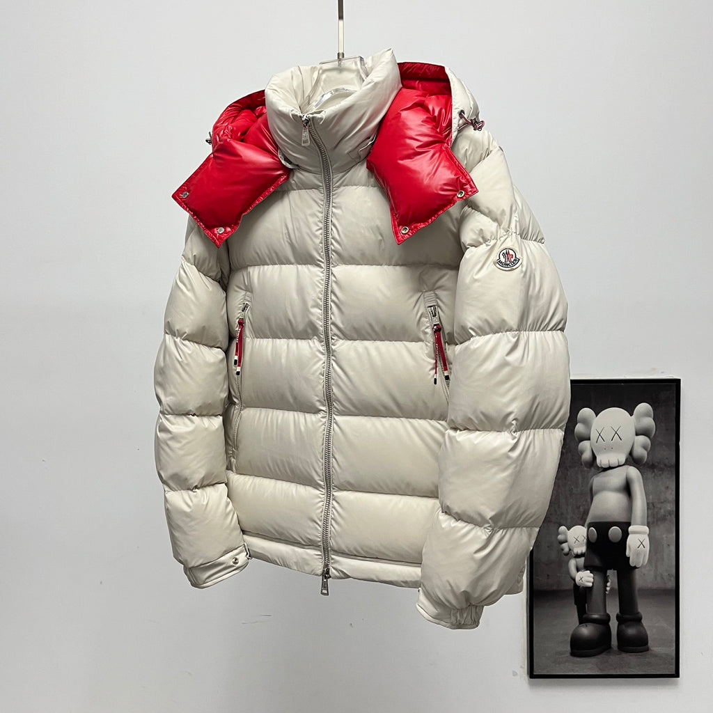 Long puffer jacket close front view, white quilted panels with red hood and shoulders