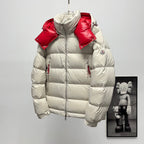 Long puffer jacket close front view, white quilted panels with red hood and shoulders