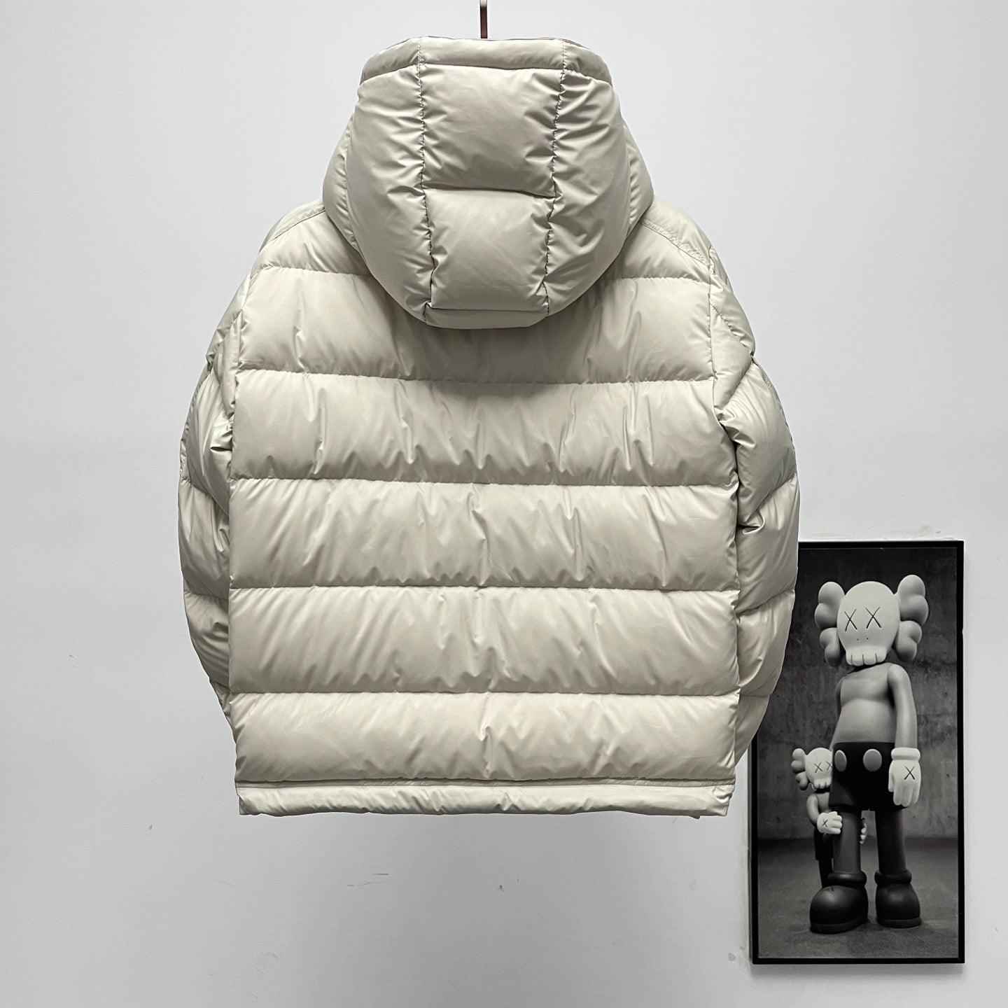 Long puffer jacket back view, white quilted puffer with attached hood