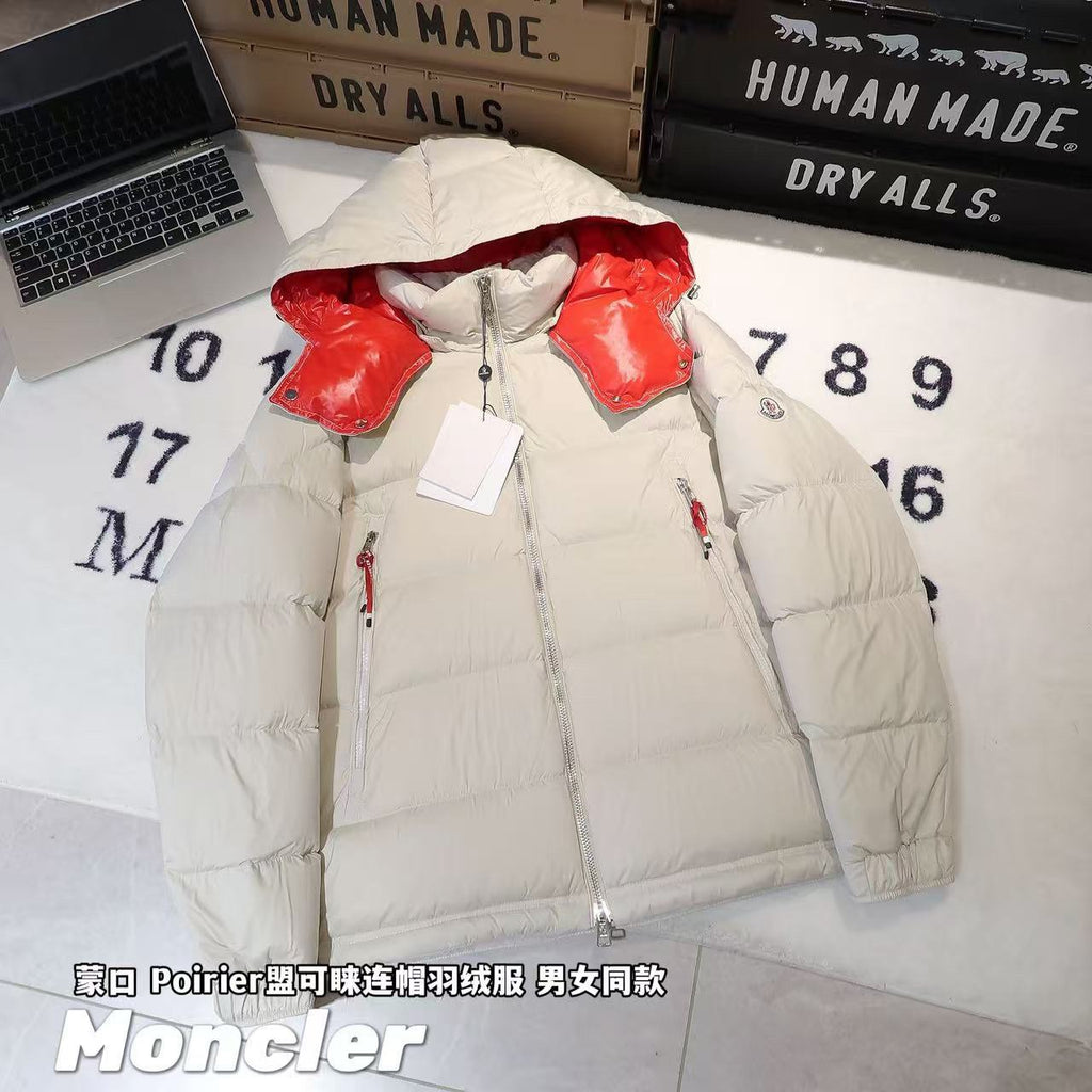 Long white puffer jacket with red collar tips, zip front, and red zipper pulls