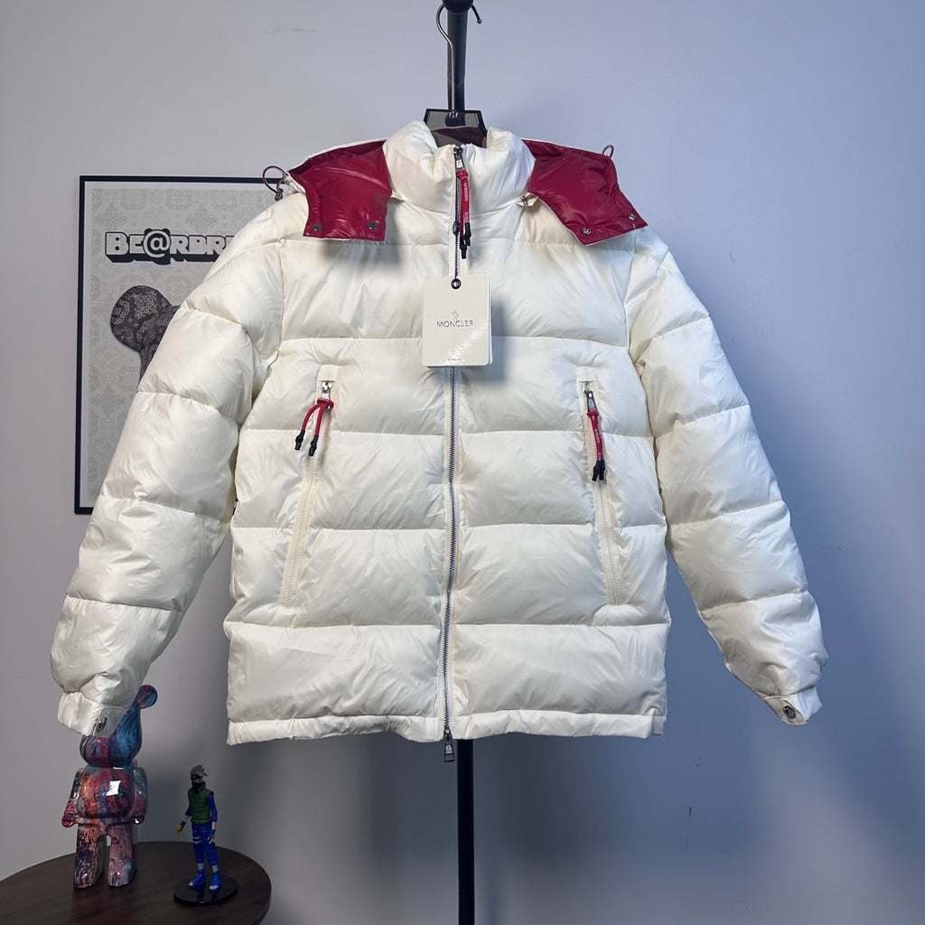 Moncler long puffer jacket with red hood and cuffs, front zip
