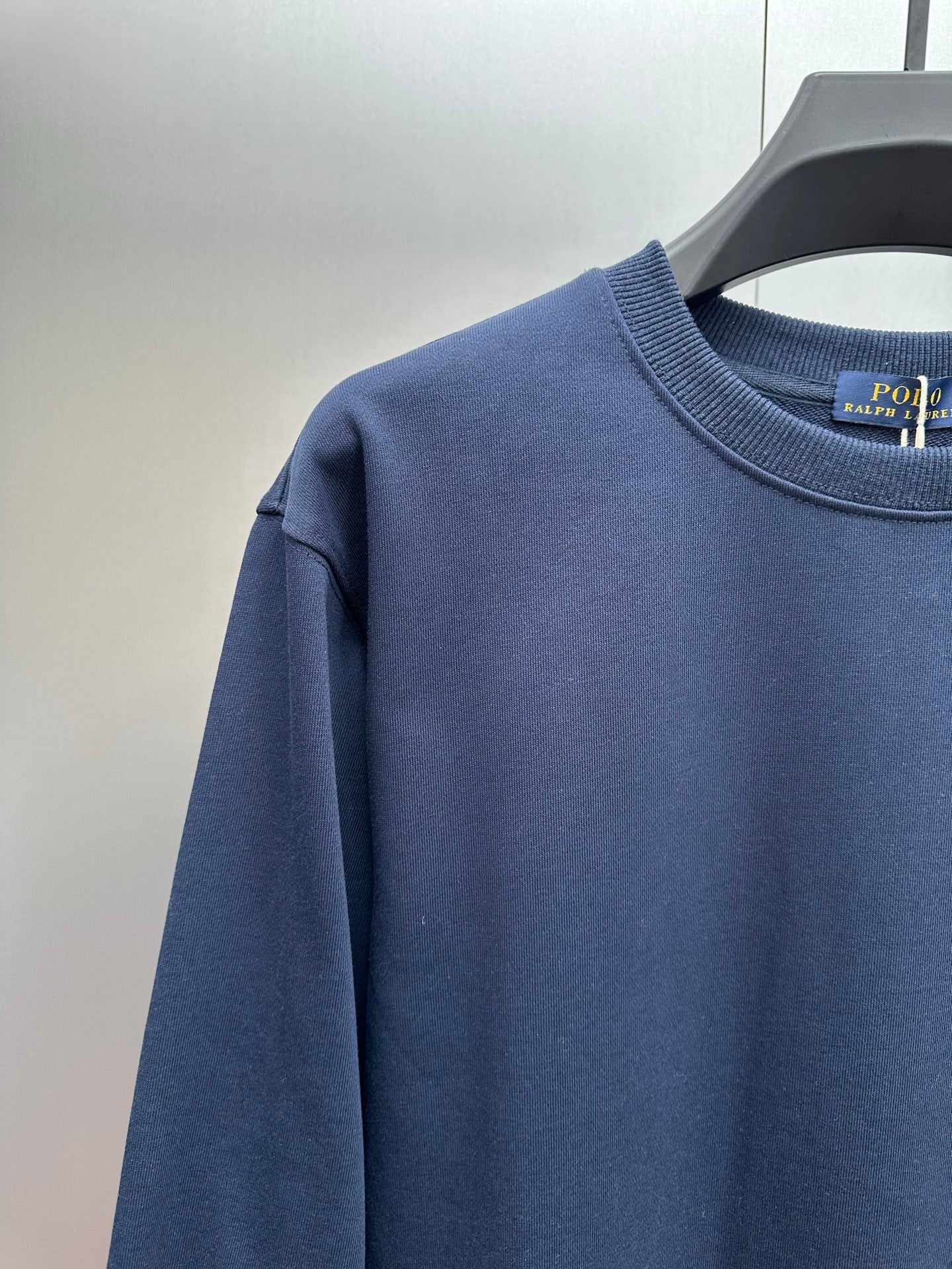 Polo Ralph Lauren crewneck sweatshirt shoulder and neckline, navy blue