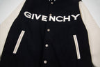 Black varsity jacket front with GIVENCHY logo, snap buttons, and striped ribbed cuffs