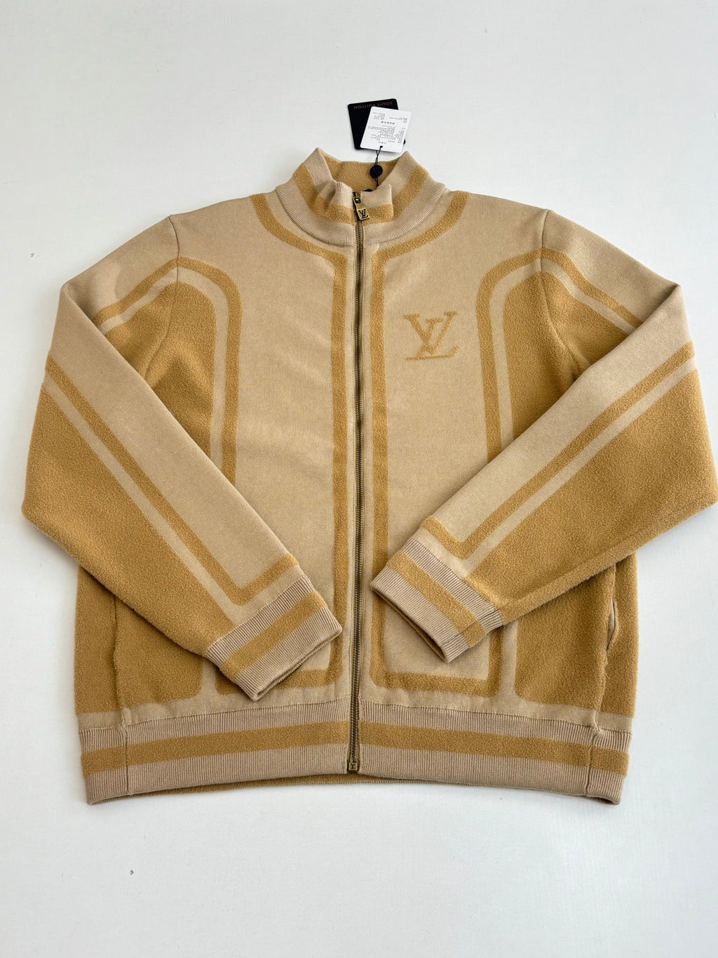Louis Vuitton beige knit zip jacket with gold monogram trim and stripe pattern