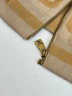 Long knit sweater with front zipper and gold LV logo charm