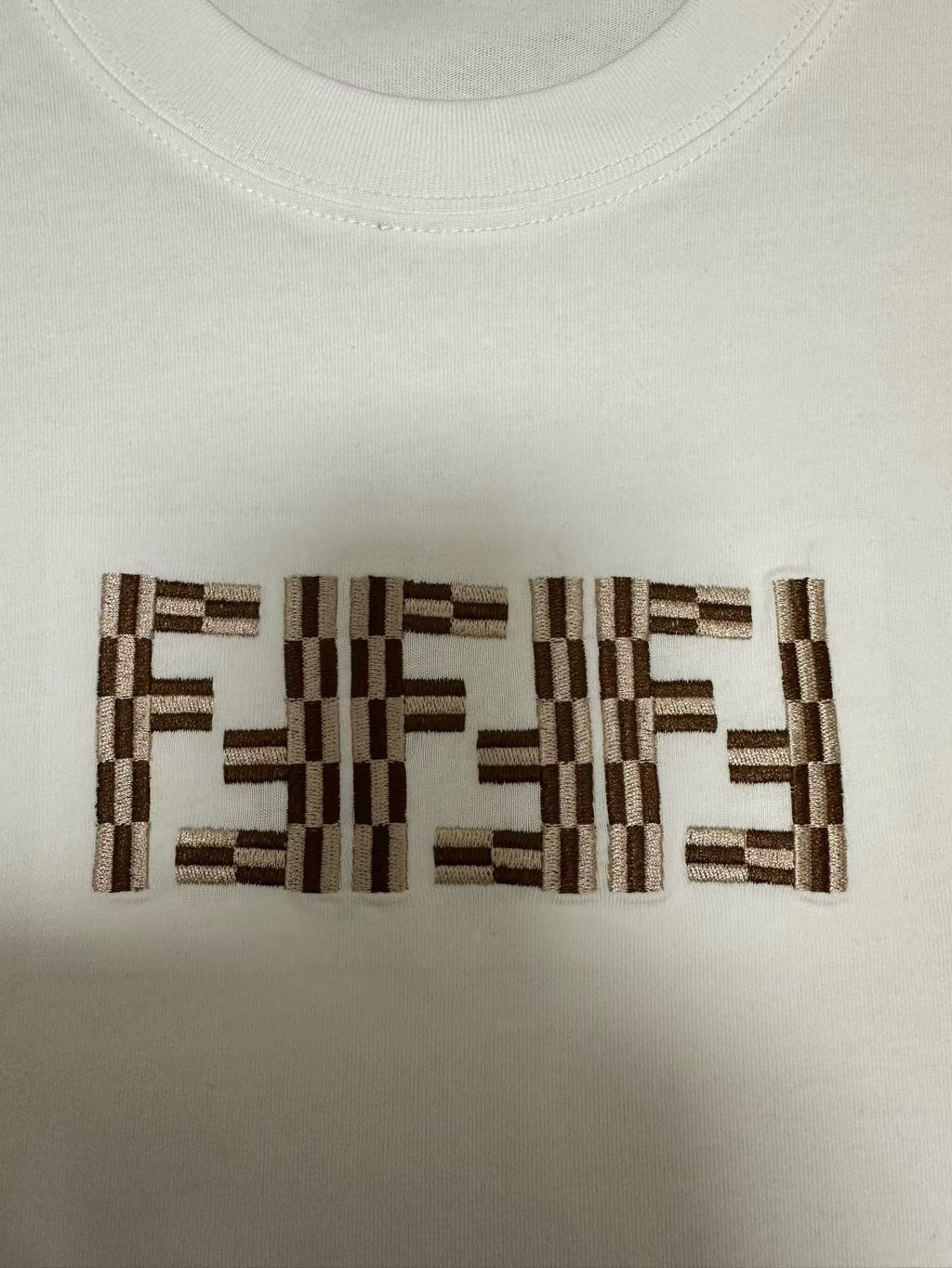 Embroidered FF logo detail on white short-sleeve T-shirt front