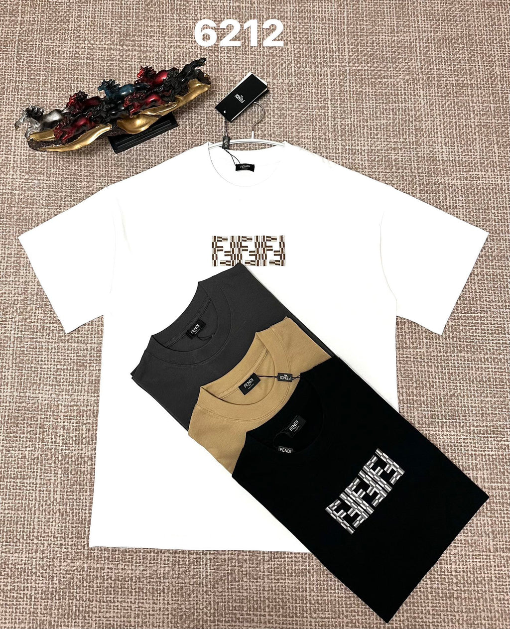 White short-sleeve T-shirt with Fendi FF logo chest and black hanging tag