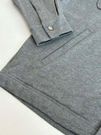 Gray Givenchy long-sleeve jacket with front flap pockets and button placket