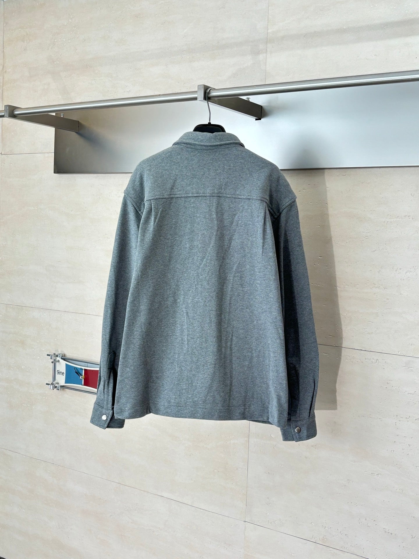 Givenchy gray button-up jacket with back yoke and buttoned cuffs