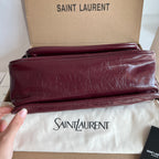 Saint Laurent burgundy leather shoulder bag with layered strap and gold chain