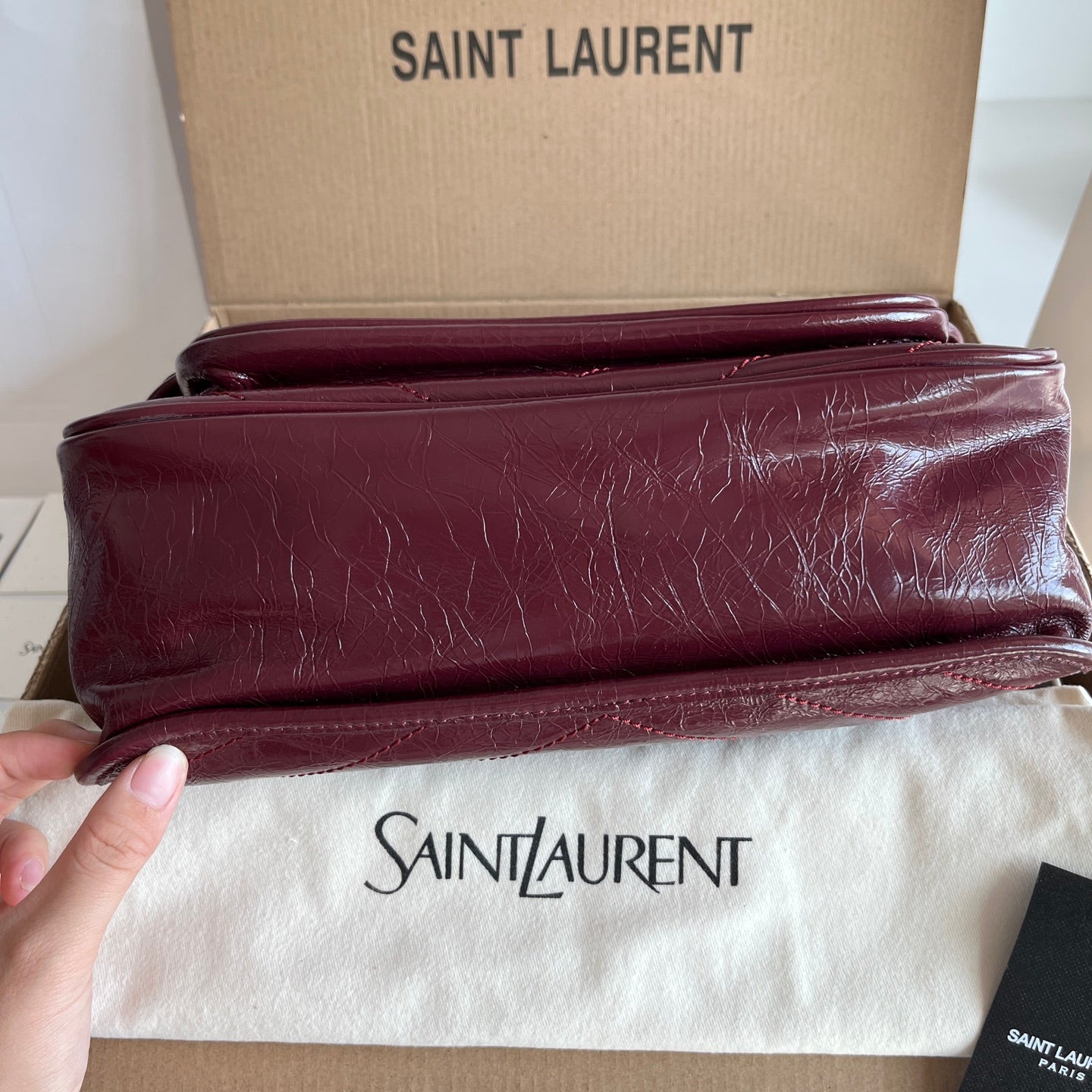 Saint Laurent burgundy leather shoulder bag with layered strap and gold chain