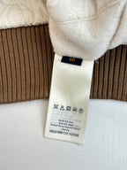 Louis Vuitton long-sleeve top, size 50 label on white care tag