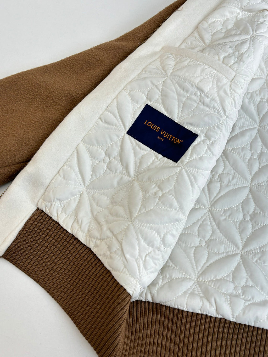 Louis Vuitton long-sleeve top, white quilted panel and brown ribbed hem