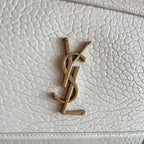 YSL bag front YSL logo in gold-tone on white textured leather