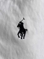 Black Polo horse logo on white fabric