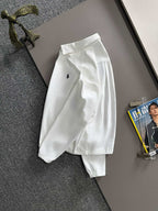 White jacket with small Polo horse logo, long sleeves