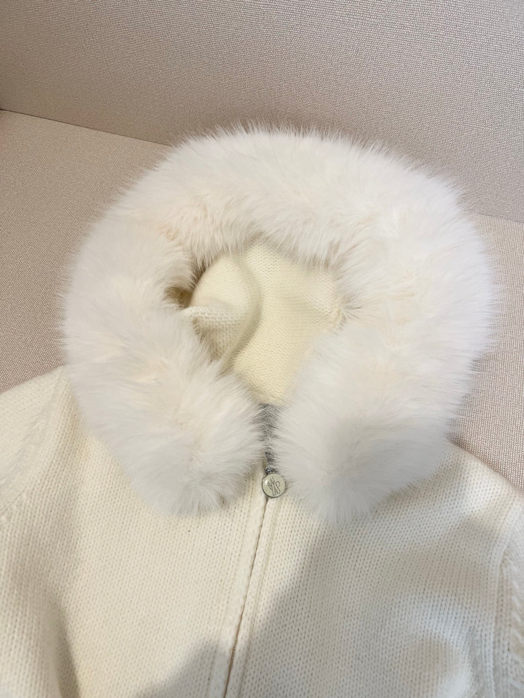 Moncler white knit sweater with full faux-fur hood and snap closure