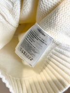 Moncler white knit sweater care label inside hem