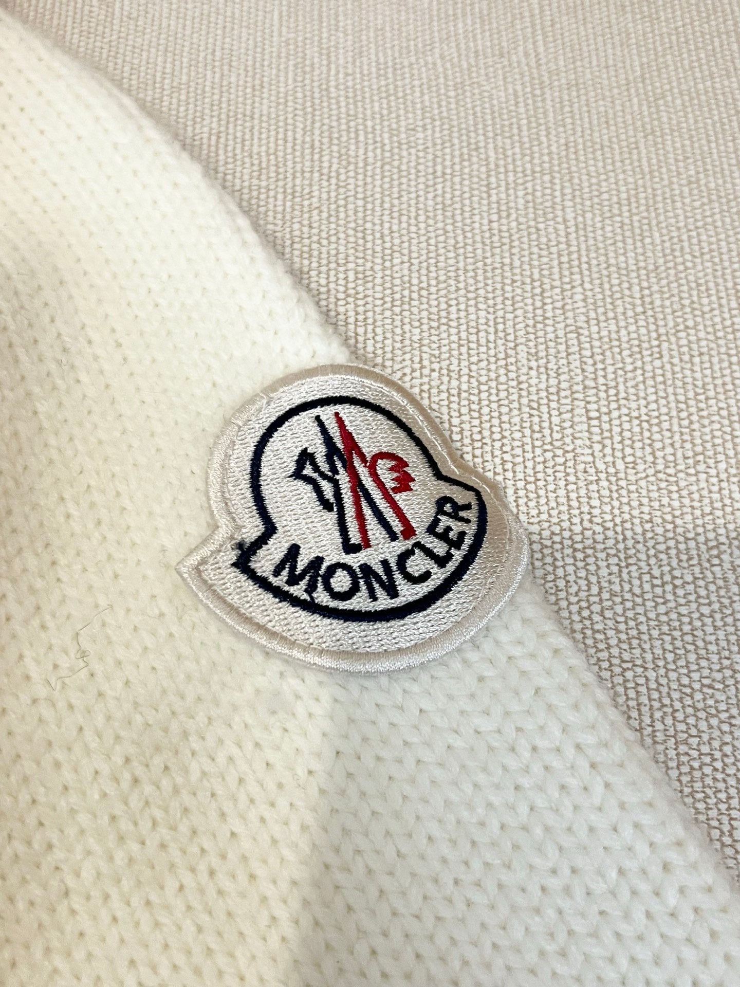 Moncler white knit sweater with embroidered Moncler logo patch