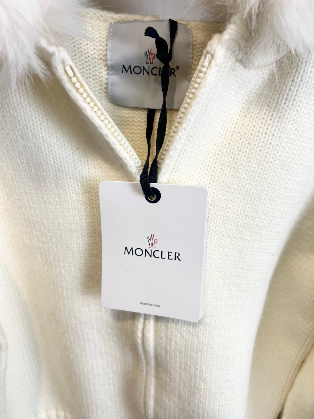 Moncler white knit zip sweater with collar brand tag and faux-fur trim